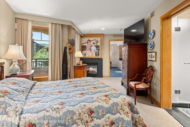 130 Wood Rd Unit 625, Snowmass Village, CO 81615 - carpeted bedroom with a glass covered fireplace and recessed lighting