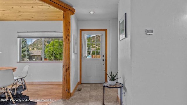 entryway featuring visible vents and baseboards