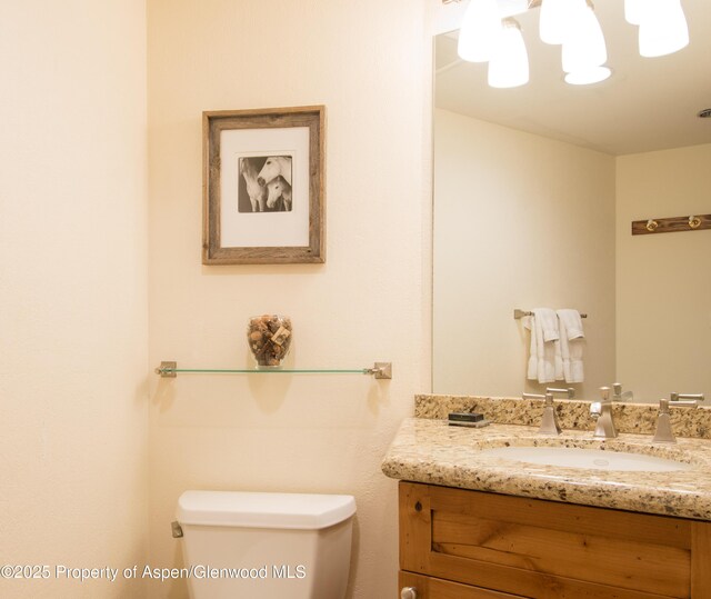 425 Wood Rd Unit 48, Snowmass Village, CO 81615 - half bath featuring vanity and toilet