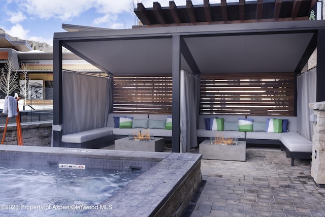 65 Wood Rd Unit 233, Snowmass Village, CO 81615 - view of patio with an outdoor living space with a fire pit