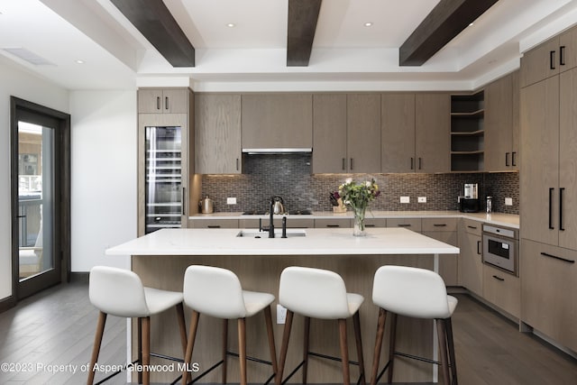 65 Wood Rd Unit 233, Snowmass Village, CO 81615 - kitchen with beverage cooler, beamed ceiling, open shelves, dark wood-style floors, and decorative backsplash