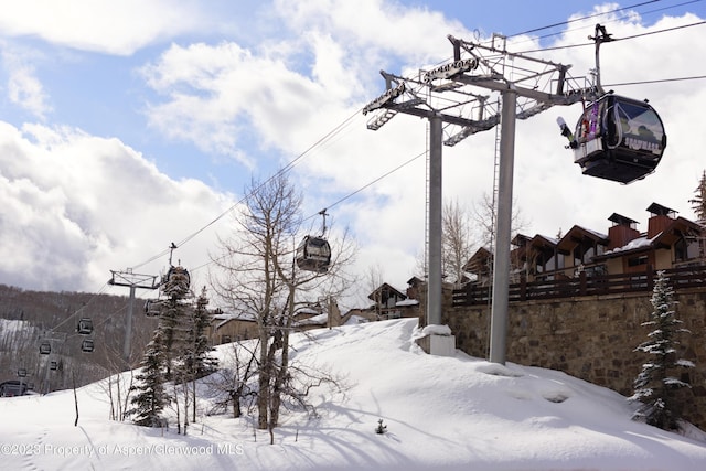 65 Wood Rd Unit 233, Snowmass Village, CO 81615 - view of yard layered in snow