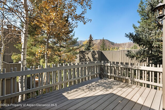 211 Meadow Ranch Dr Unit D5A, Snowmass Village, CO 81615 - wooden deck with a mountain view