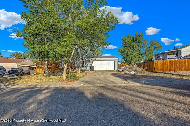 714 Westridge Rd, Craig, CO 81625 - view of front of property with concrete driveway and an attached garage