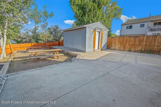 714 Westridge Rd, Craig, CO 81625 - fenced backyard featuring a patio area and a storage unit