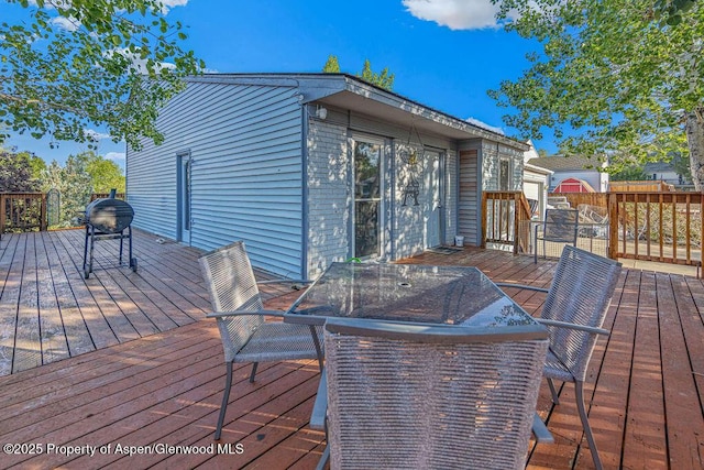 714 Westridge Rd, Craig, CO 81625 - wooden deck featuring outdoor dining area
