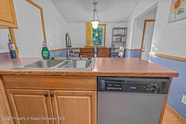714 Westridge Rd, Craig, CO 81625 - kitchen featuring dishwasher, a textured ceiling, decorative light fixtures, and a textured wall