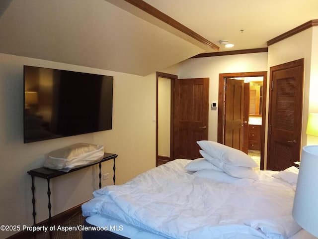 bedroom featuring crown molding