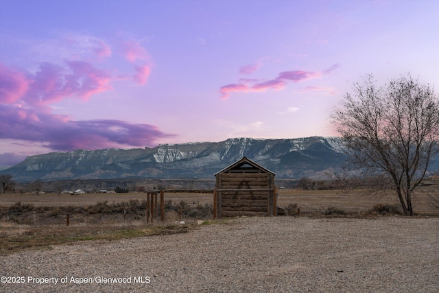 property view of mountains featuring a rural view