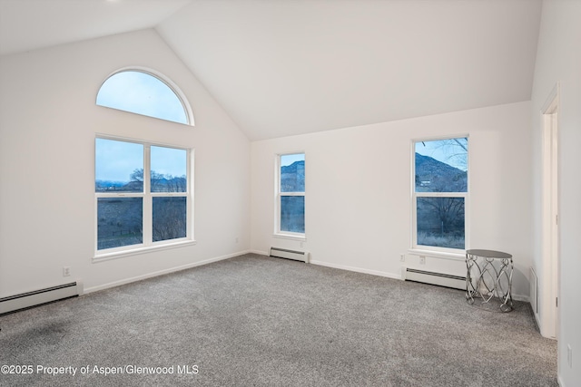 carpeted empty room featuring baseboards, baseboard heating, and high vaulted ceiling