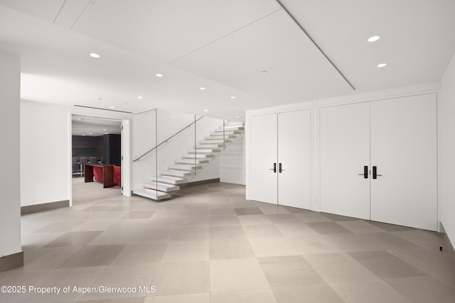 401 Eagle Park Dr, Aspen, CO 81611 - basement featuring recessed lighting and stairway