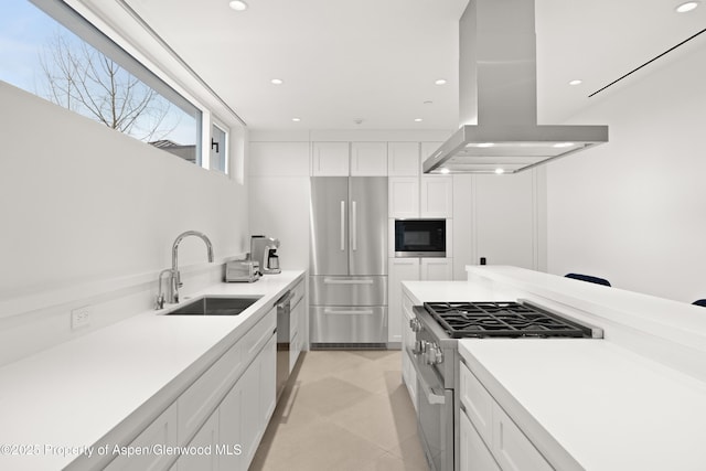 401 Eagle Park Dr, Aspen, CO 81611 - kitchen featuring stainless steel appliances, island exhaust hood, a sink, recessed lighting, and white cabinetry