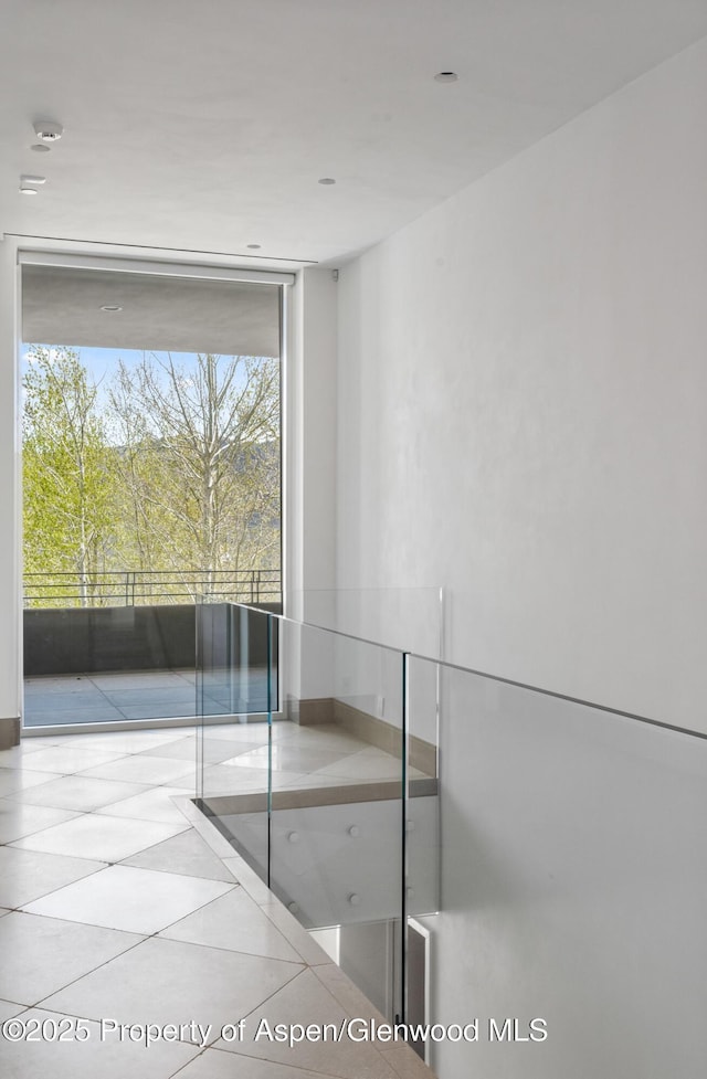 401 Eagle Park Dr, Aspen, CO 81611 - bathroom with tile patterned floors and a wall of windows