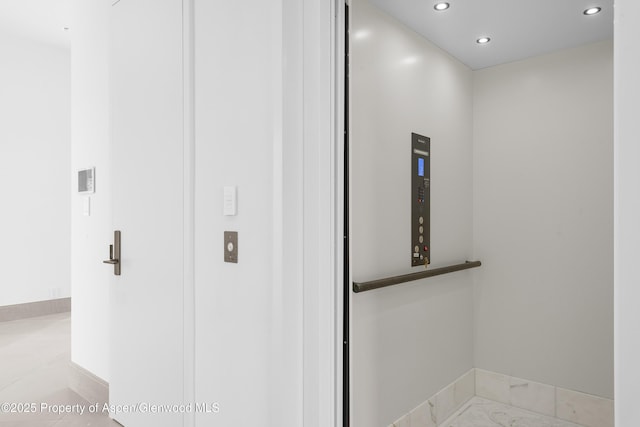 401 Eagle Park Dr, Aspen, CO 81611 - bathroom featuring elevator, recessed lighting, and baseboards