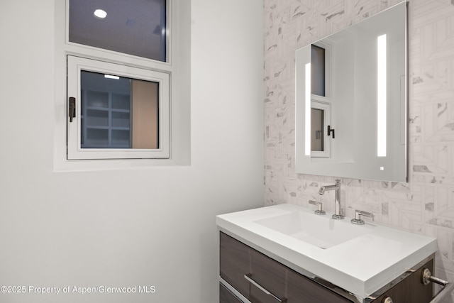 401 Eagle Park Dr, Aspen, CO 81611 - bathroom with vanity and decorative backsplash
