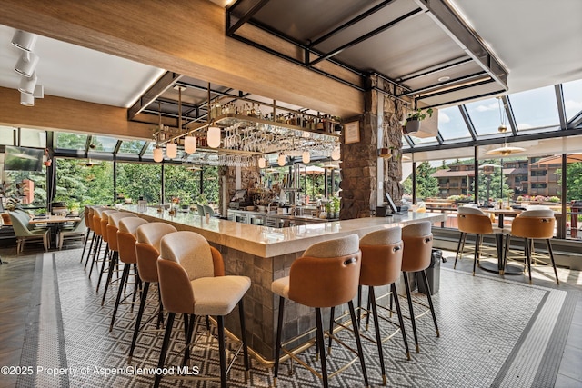 300 Carriage Way 623 & 625, Snowmass Village, CO 81615 - community bar area with a wall of windows