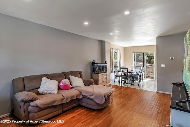 2618 Apache Ct, Rifle, CO 81650 - living room featuring light wood finished floors and recessed lighting