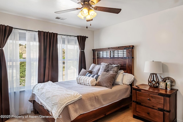 2618 Apache Ct, Rifle, CO 81650 - bedroom with multiple windows and ceiling fan