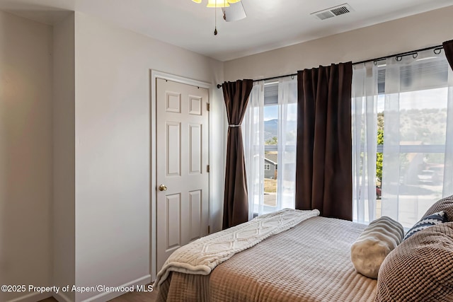 2618 Apache Ct, Rifle, CO 81650 - bedroom with access to exterior and ceiling fan