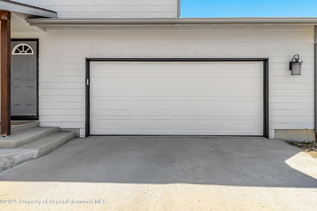 2618 Apache Ct, Rifle, CO 81650 - garage with concrete driveway