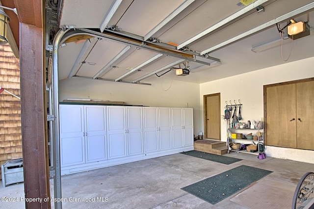 garage featuring a garage door opener