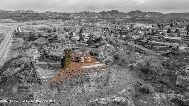 aerial view featuring a mountain view