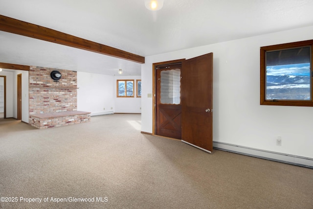 unfurnished living room with beam ceiling, carpet, and baseboard heating