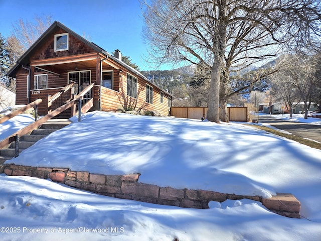 view of front of home featuring covered porch