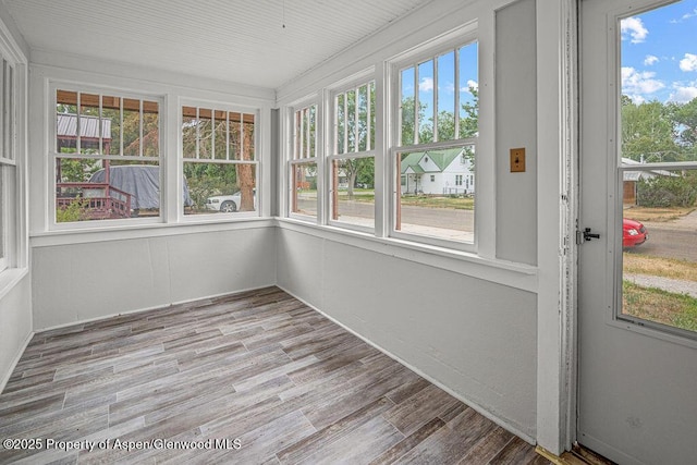 774 School St, Craig, CO 81625 - unfurnished sunroom with plenty of natural light and wood finished floors