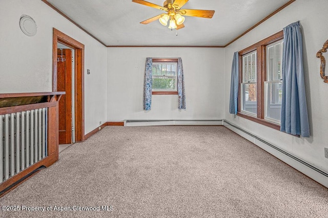 774 School St, Craig, CO 81625 - empty room with ornamental molding, carpet flooring, radiator, a ceiling fan, and baseboard heating