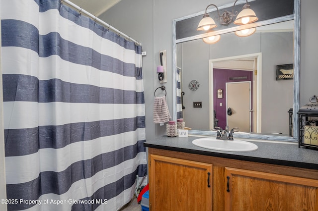 435 32nd Rd Unit 705, Clifton, CO 81520 - bathroom featuring vanity and a shower with shower curtain