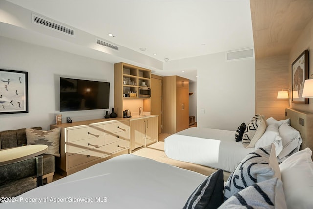 bedroom featuring sink