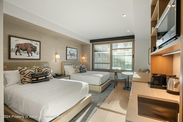 bedroom featuring hardwood / wood-style floors