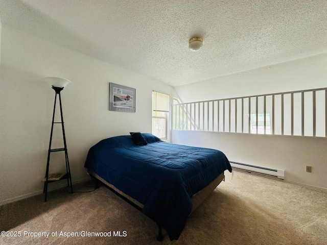 1024 E Ave, Rifle, CO 81650 - carpeted bedroom with baseboard heating, a textured ceiling, and baseboards