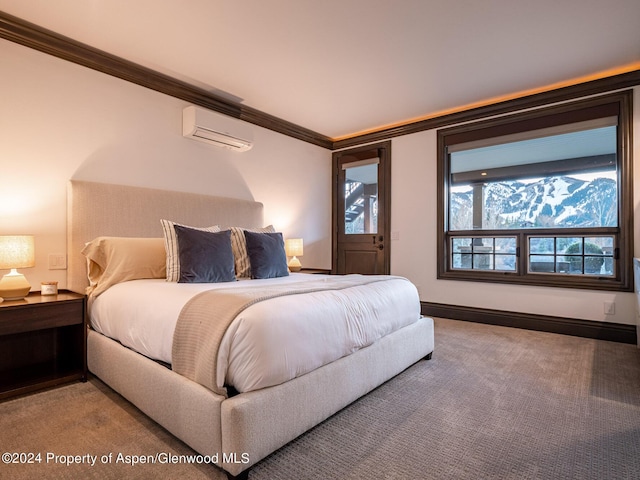 carpeted bedroom featuring an AC wall unit and crown molding