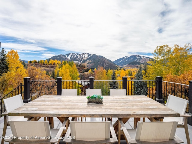 wooden terrace featuring a mountain view