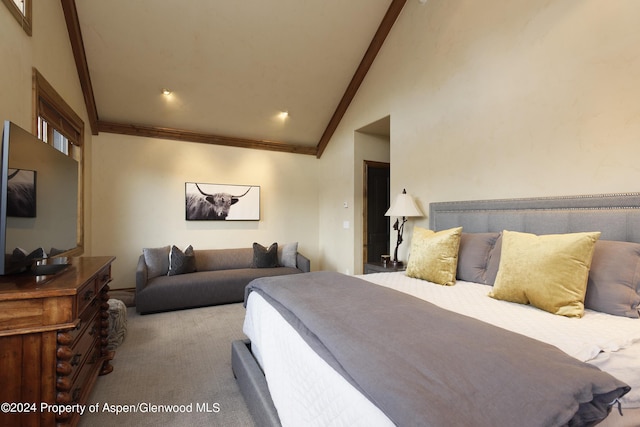 carpeted bedroom featuring vaulted ceiling