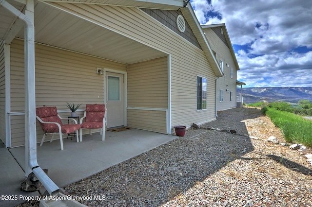 41 Angelica Cir, Parachute, CO 81635 - view of patio / terrace with a mountain view