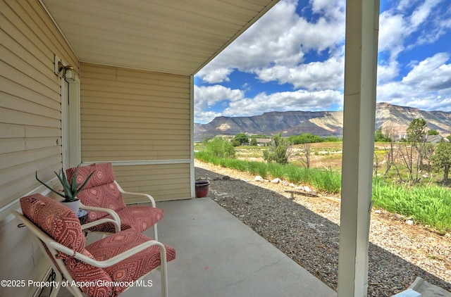 41 Angelica Cir, Parachute, CO 81635 - view of patio / terrace featuring a mountain view