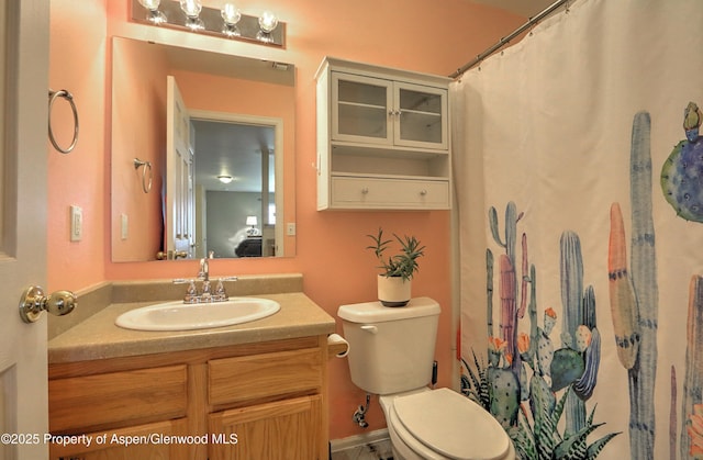 41 Angelica Cir, Parachute, CO 81635 - bathroom featuring vanity, toilet, and curtained shower