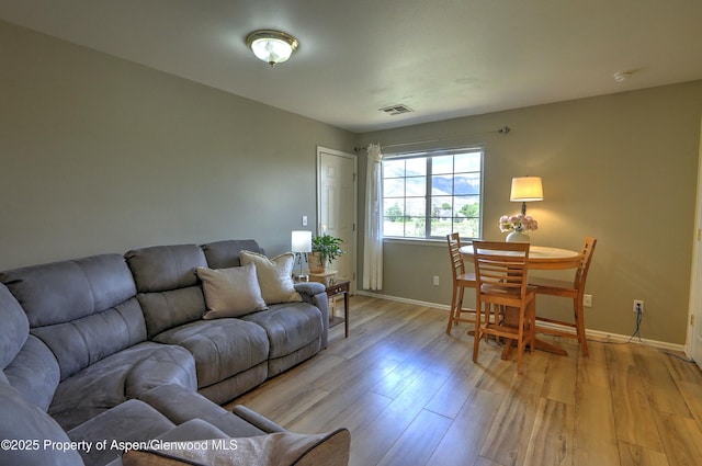 41 Angelica Cir, Parachute, CO 81635 - living area featuring light wood finished floors and baseboards