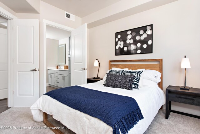 253 Wulfsohn Rd Unit 122, Glenwood Springs, CO 81601 - carpeted bedroom featuring visible vents