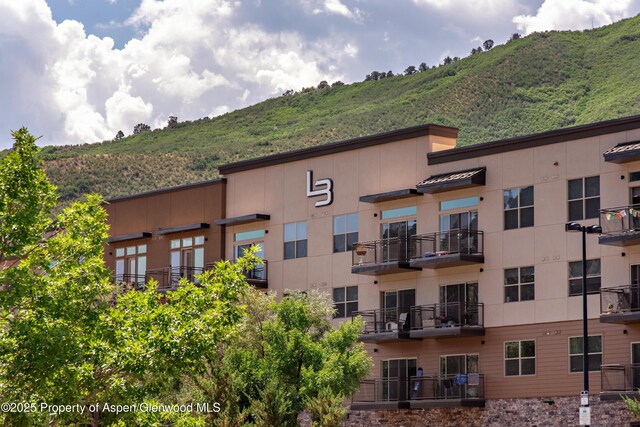 253 Wulfsohn Rd Unit 122, Glenwood Springs, CO 81601 - view of building exterior featuring a mountain view