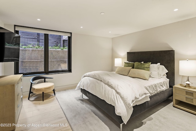 bedroom featuring light wood-type flooring