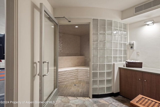 bathroom with walk in shower