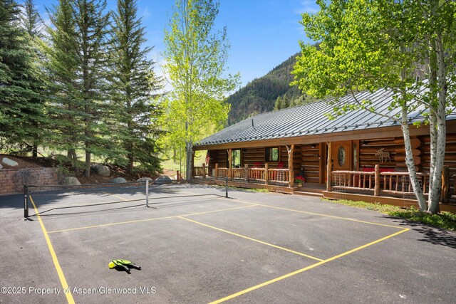 2134 Lower River Rd, Snowmass, CO 81654 - view of tennis court with a mountain view