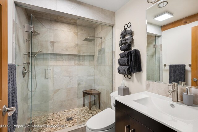 2134 Lower River Rd, Snowmass, CO 81654 - bathroom featuring a shower stall, toilet, and vanity