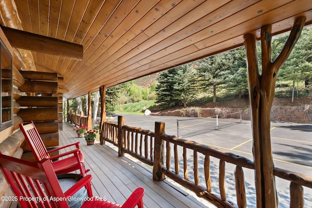 2134 Lower River Rd, Snowmass, CO 81654 - deck with a tennis court