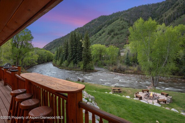2134 Lower River Rd, Snowmass, CO 81654 - mountain view featuring a heavily wooded area and a large body of water