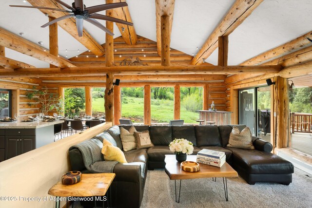 2134 Lower River Rd, Snowmass, CO 81654 - living area featuring a ceiling fan and log walls